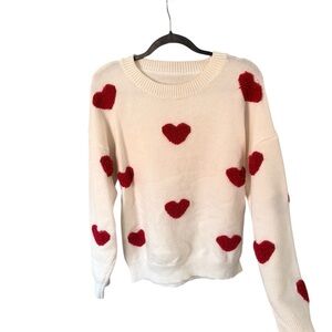 Cozy Cream Sweater with Red Heart Accents